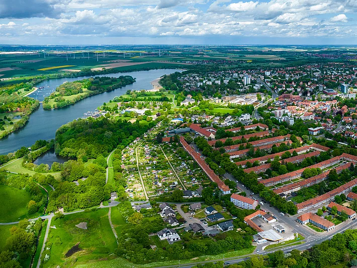 shallow focus photo of woman in gray jacket
