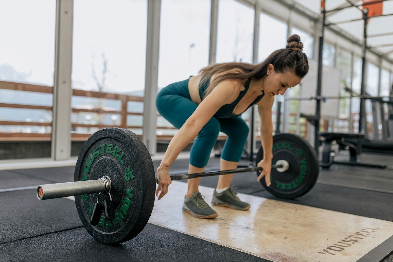 A Woman About to Carry a Barbell