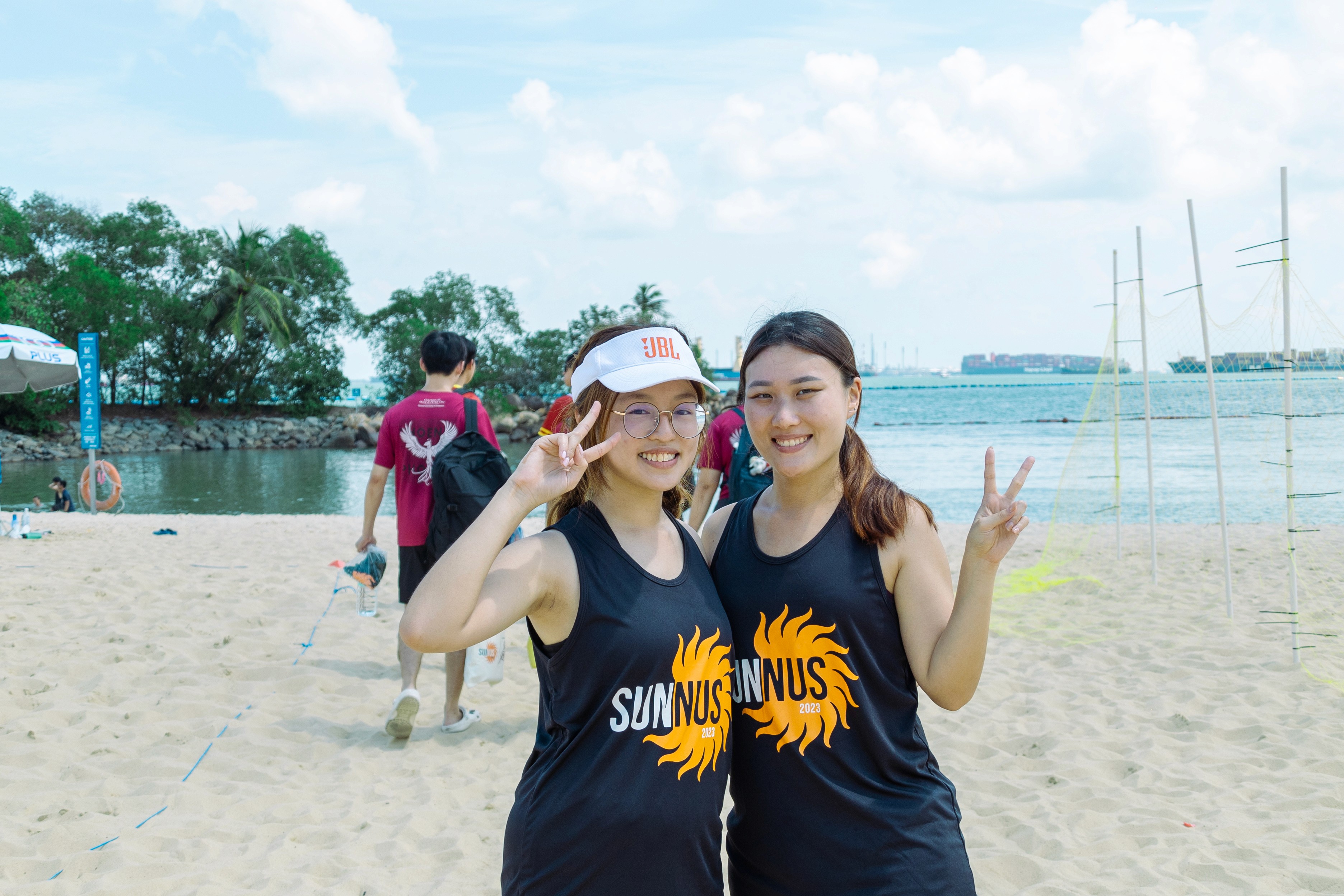 2 girls having fun on the beach