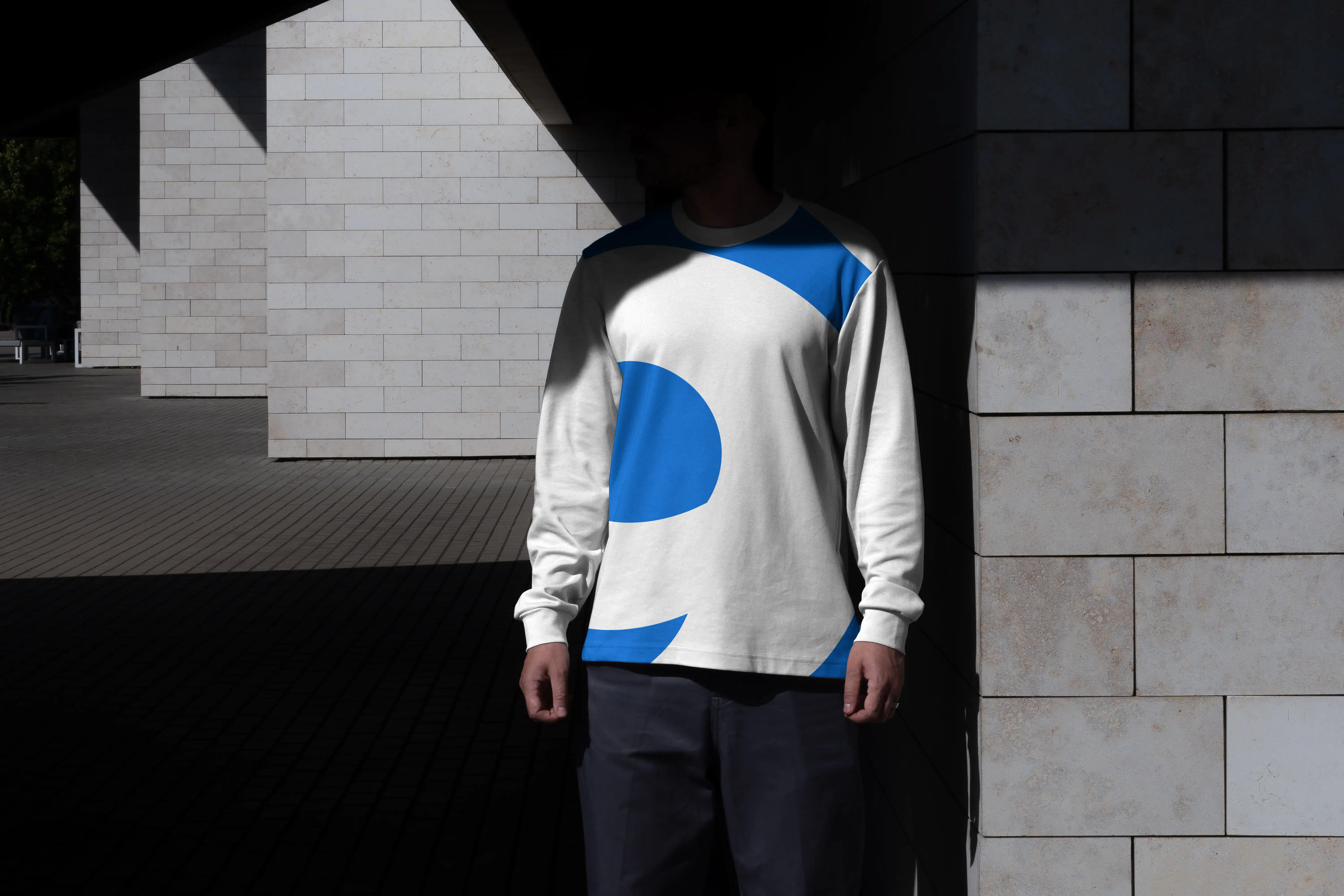 Mock-up with Console9 T-Shirt, expanded blue logo on white T-Shirt