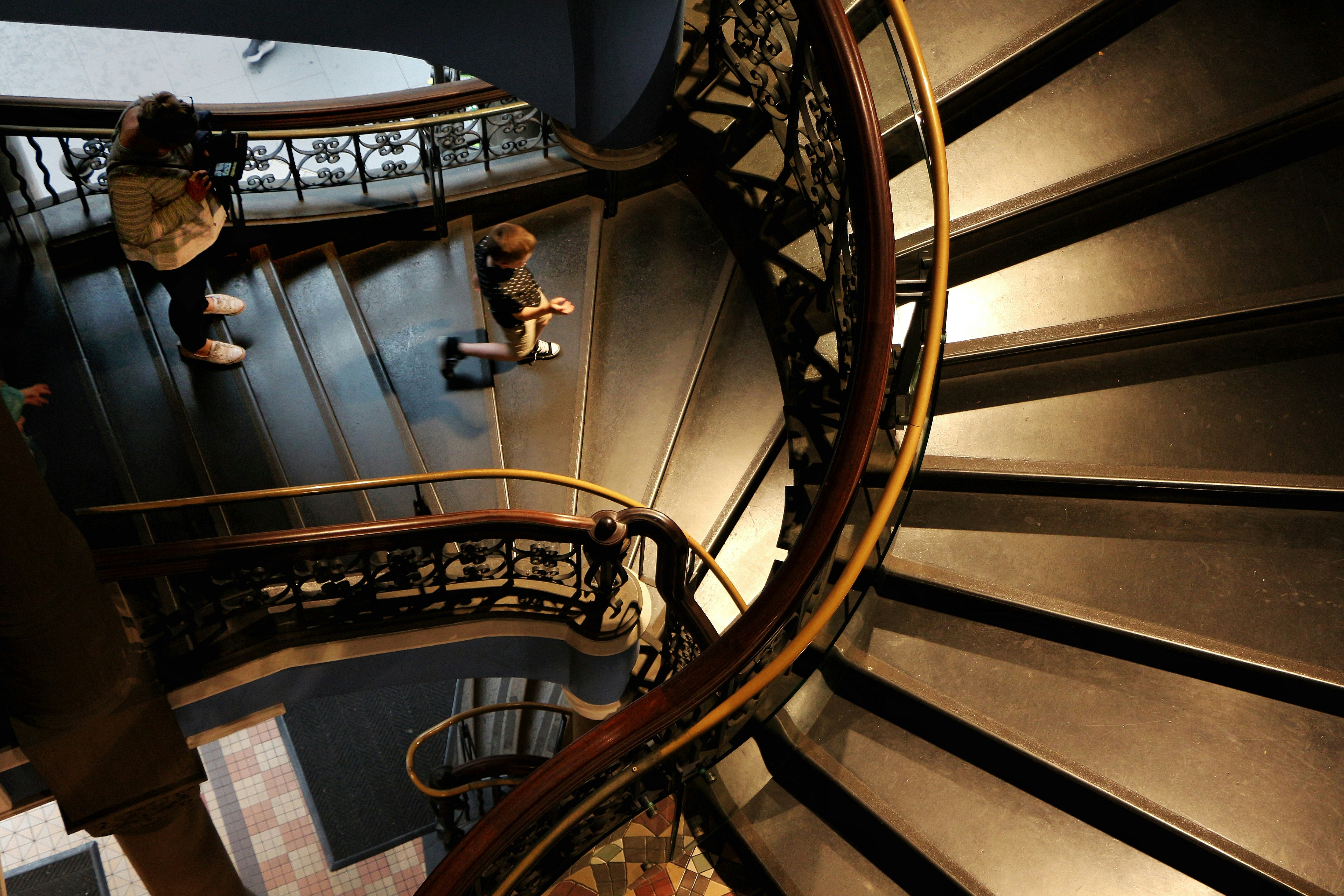 Traditional-style stairs inside a hotel interior.
