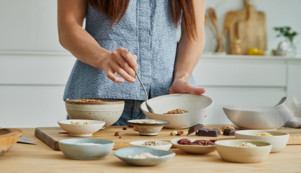 woman in black leggings and white sports bra