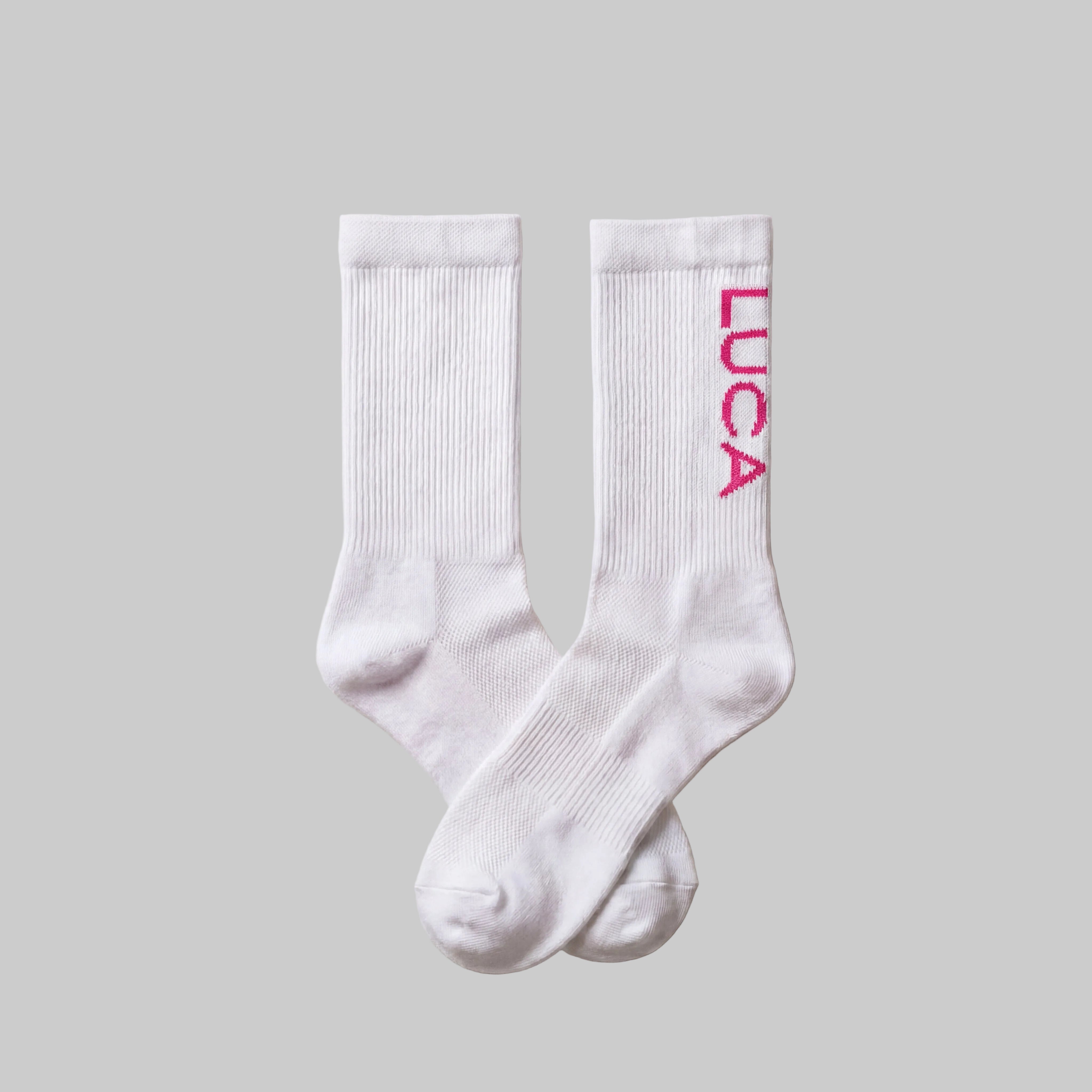 LUCA Traction long cycling socks in hibiscus colourway, flat lay