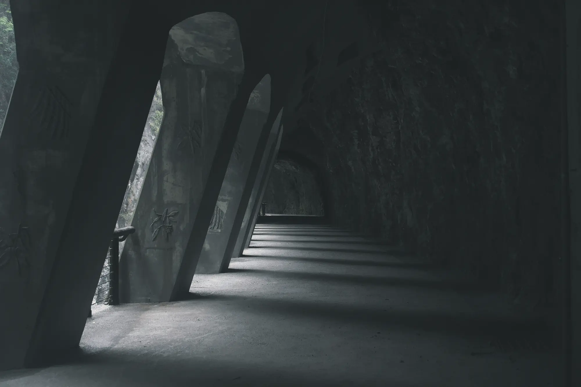 People interact with a futuristic sphere and orb structure