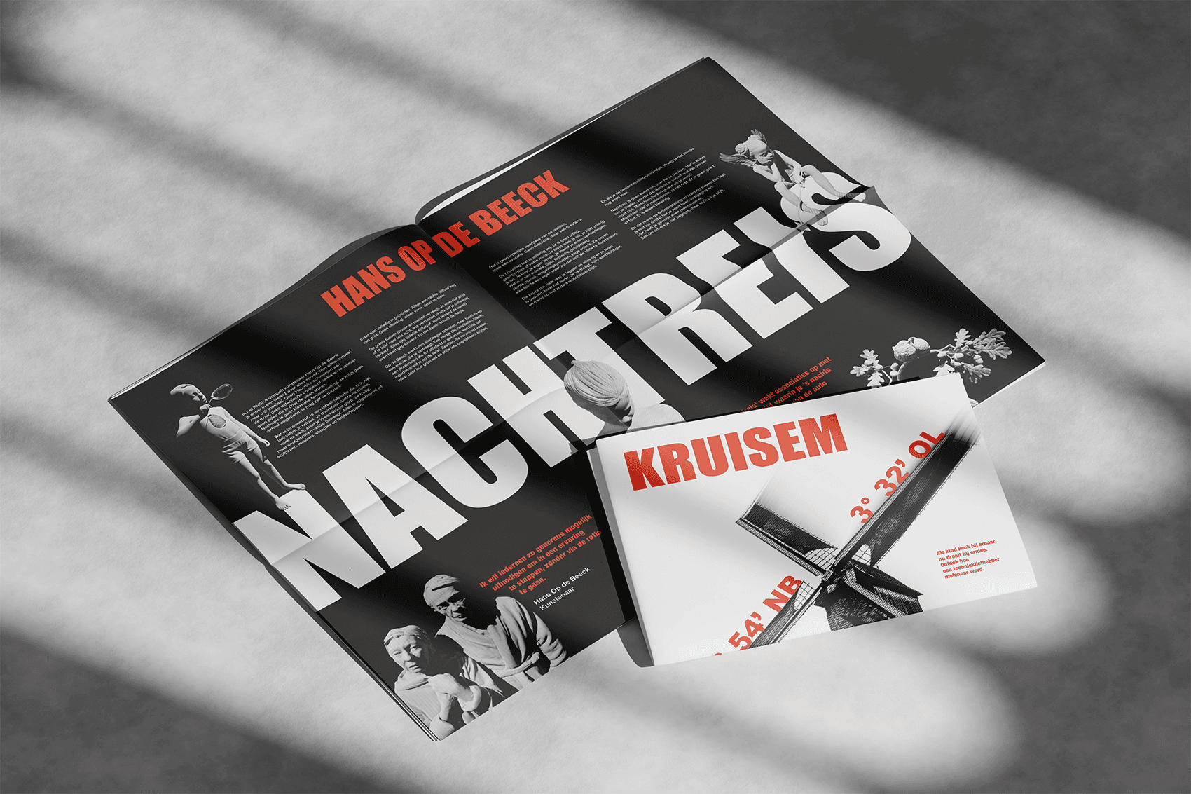 Open book with sunlight and shadows highlighting editorial typography design