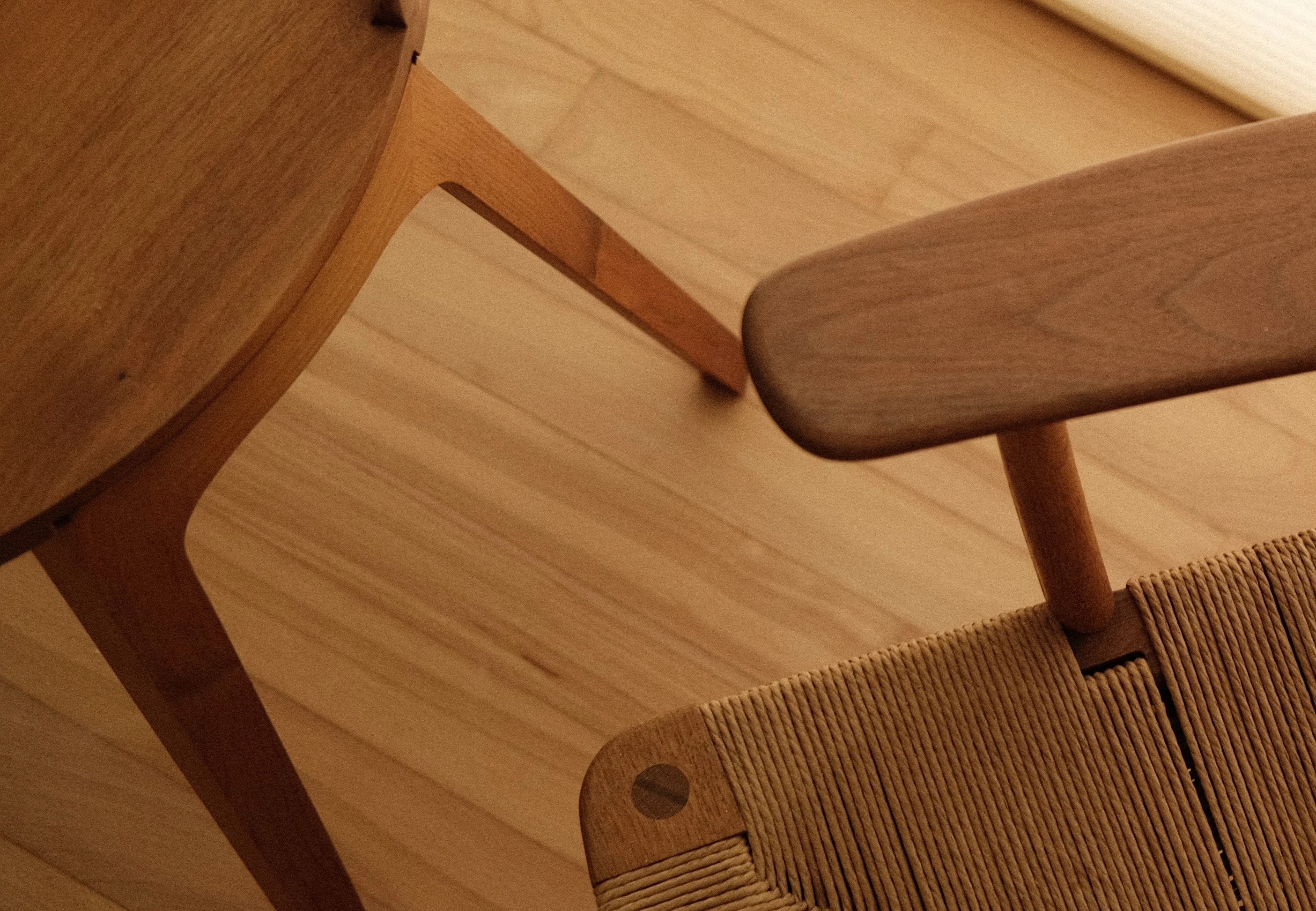 Close-up of wooden dining chair and table, Scandinavian-inspired home decor Singapore