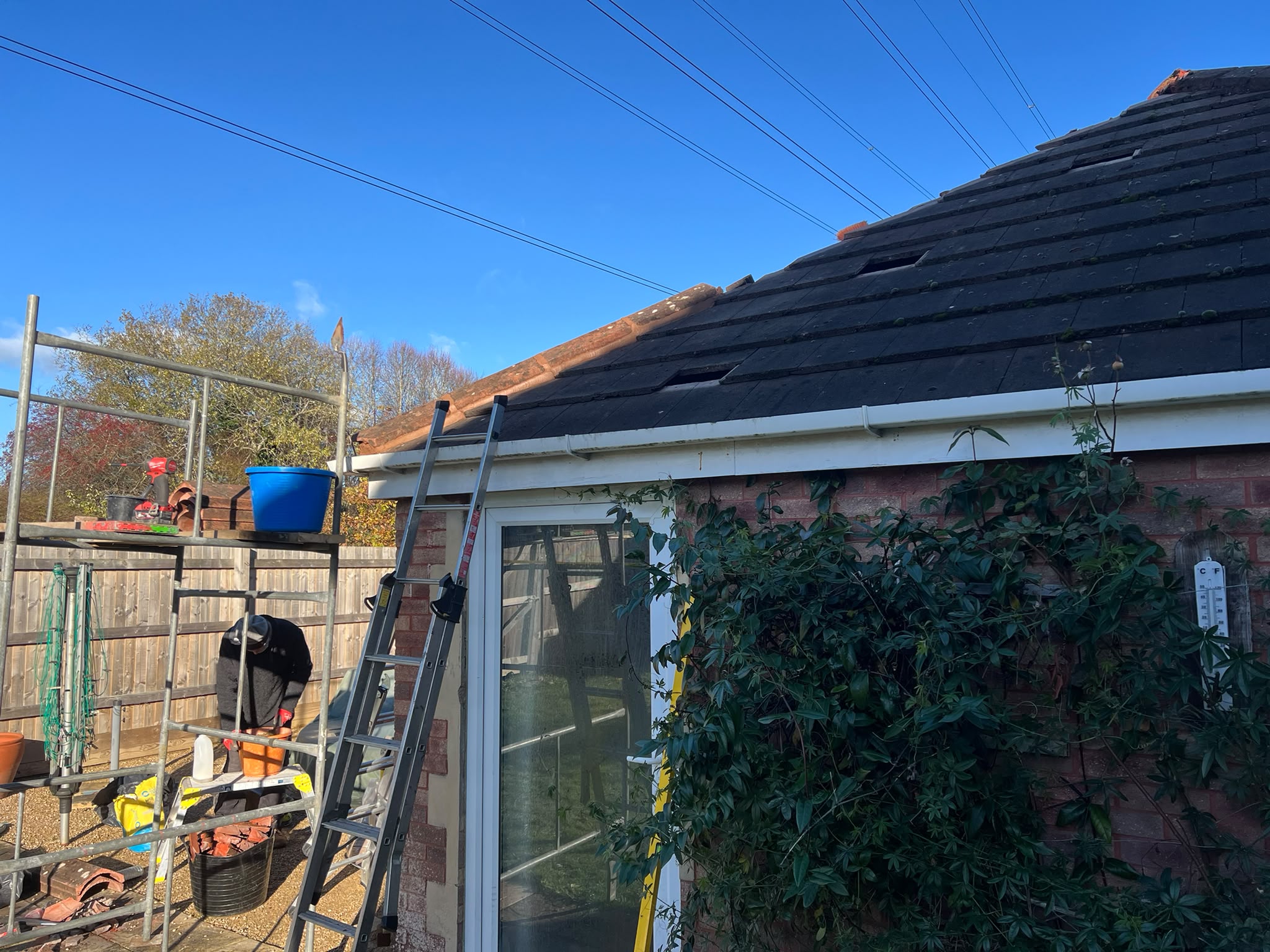 Restored slate roof with dormer windows