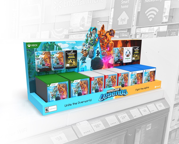 A counter top Minecraft Legends sales display with Xbox and Playstation game versions