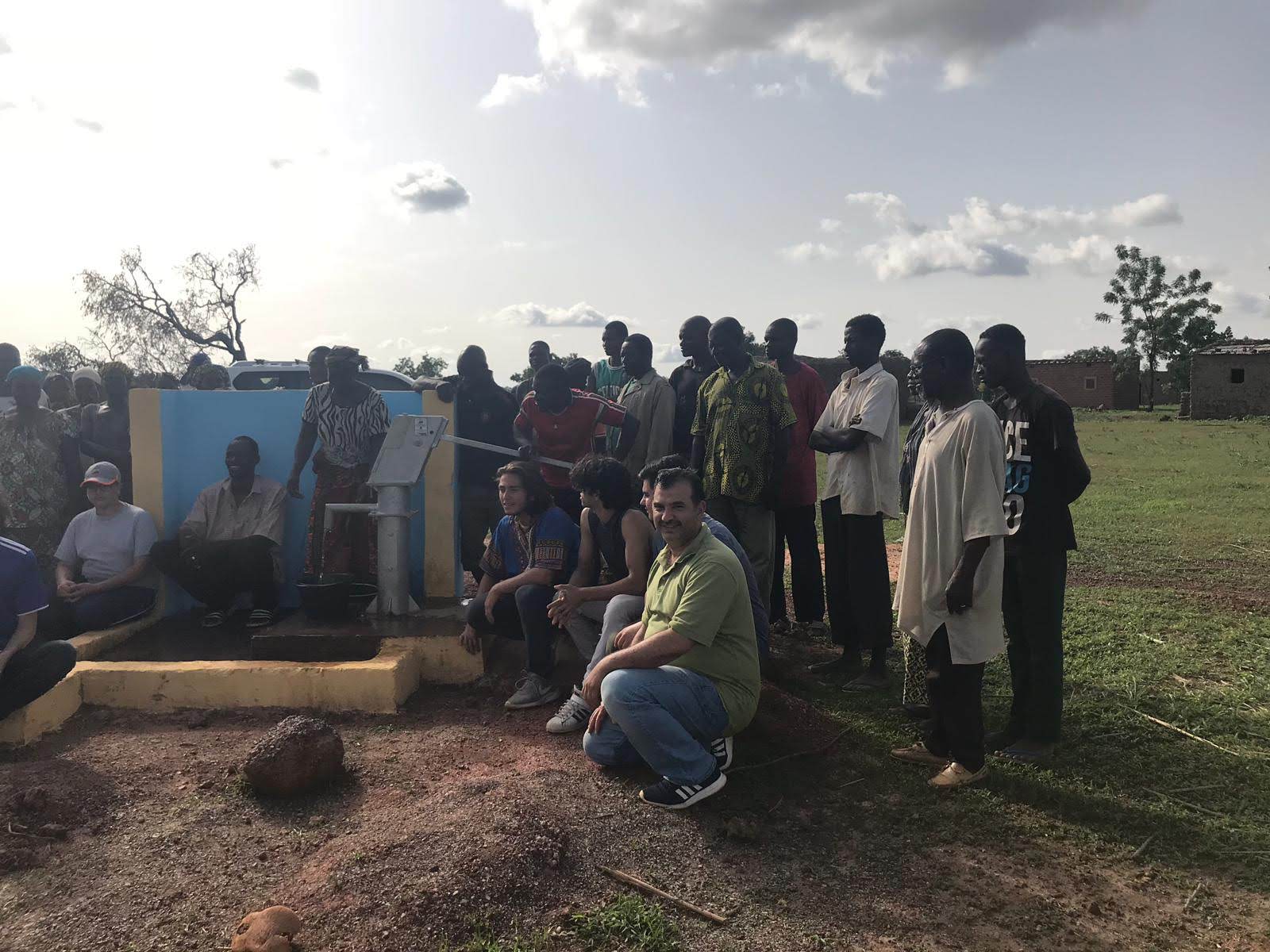woman in black blazer smiling