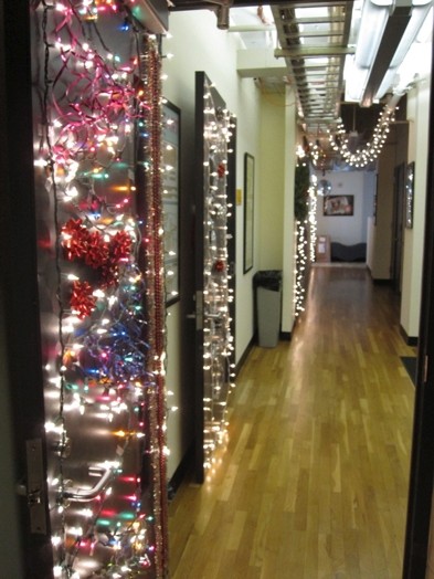 A photo of an art gallery filled with light strips.