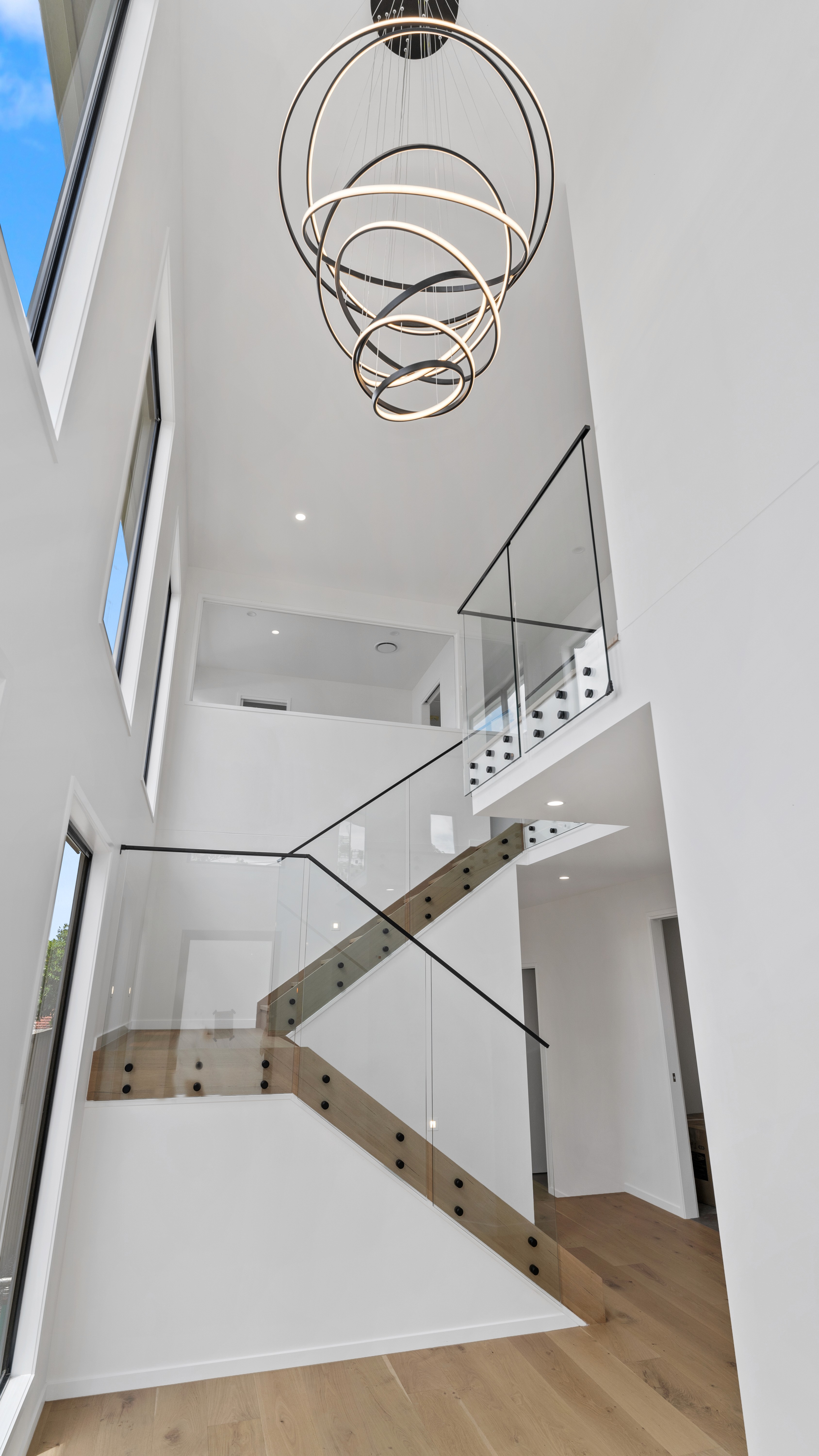 A central void in a custom home design by Flascon Construction Group