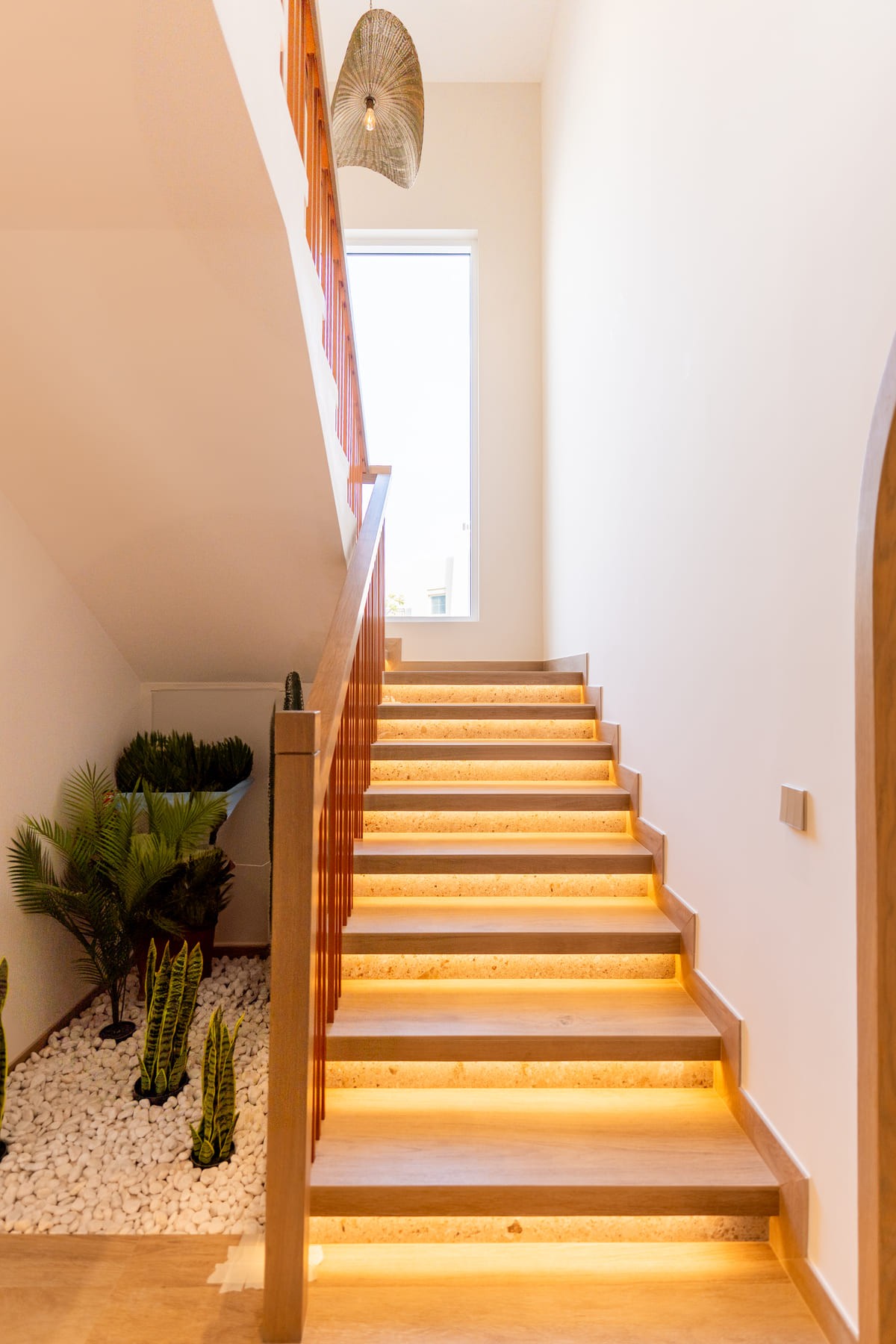 Picture of a staircase with a glass window 