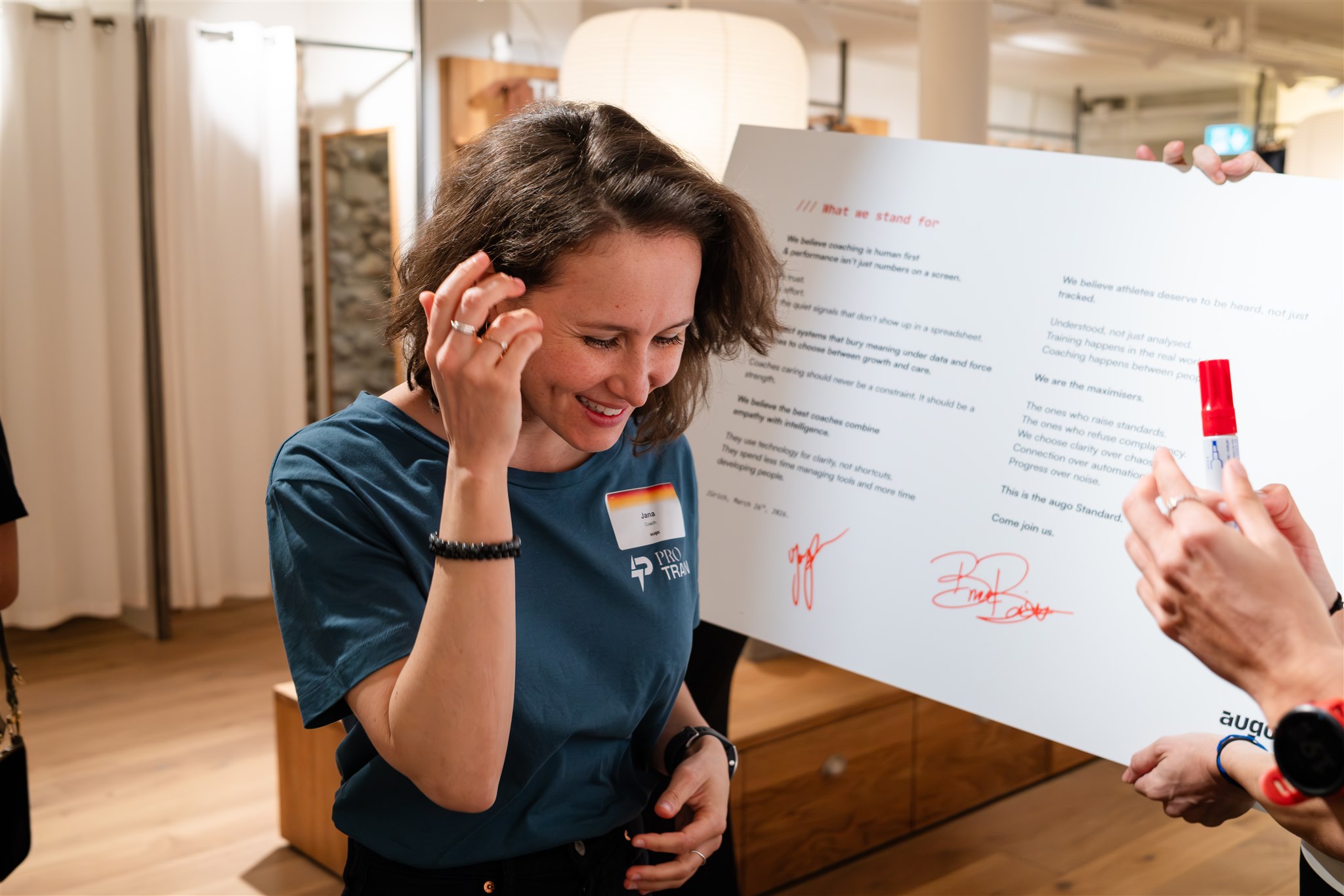 Guest signing event board at augo launch event Zurich