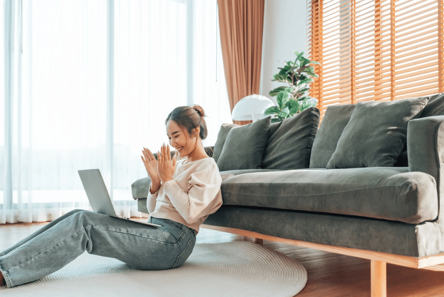 Successful Amazon seller celebrating PPC campaign wins achieved through automated real-time bid management