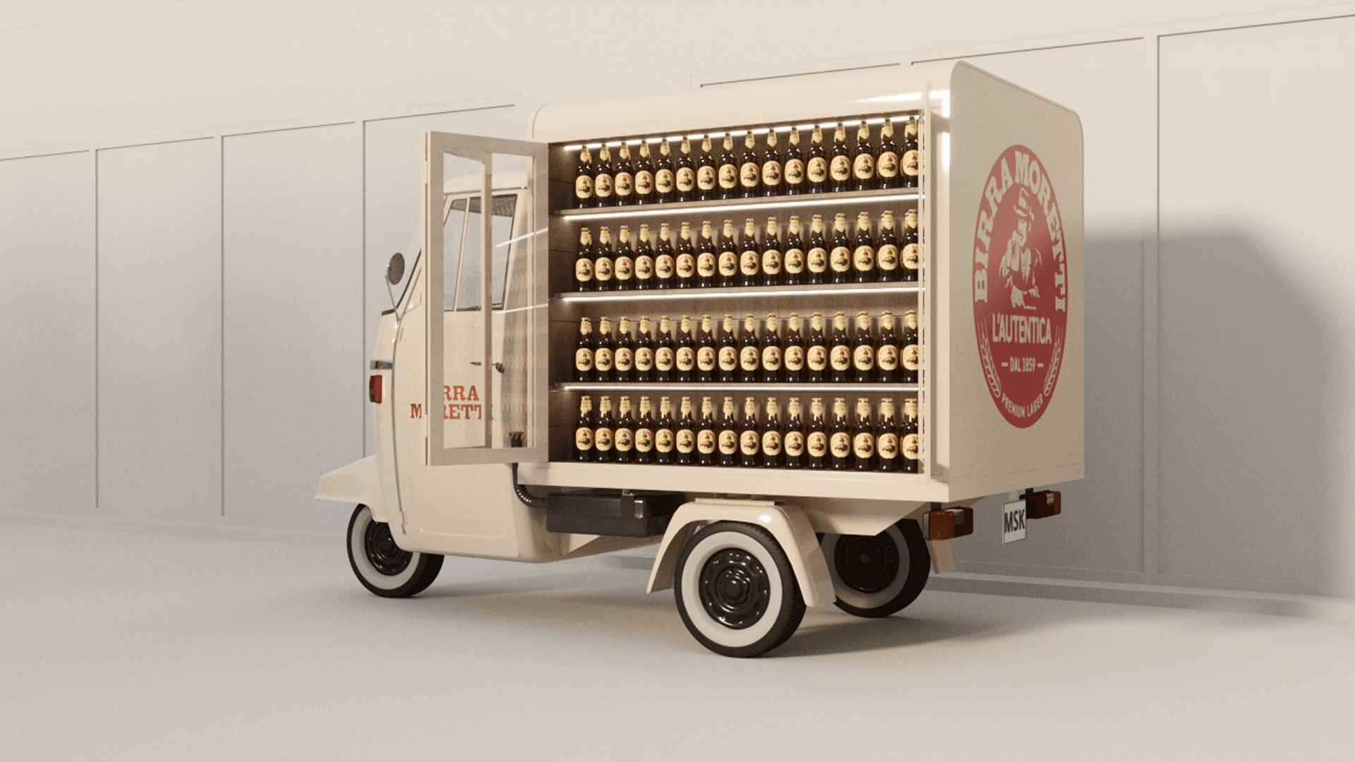 Branded mini Italian delivery truck featuring Birra Moretti logos, adding a playful and authentic touch to the space