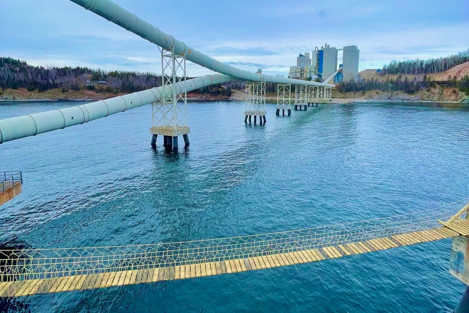 Streetside billboard with flyposters of the Batch.Works brand and illustrations