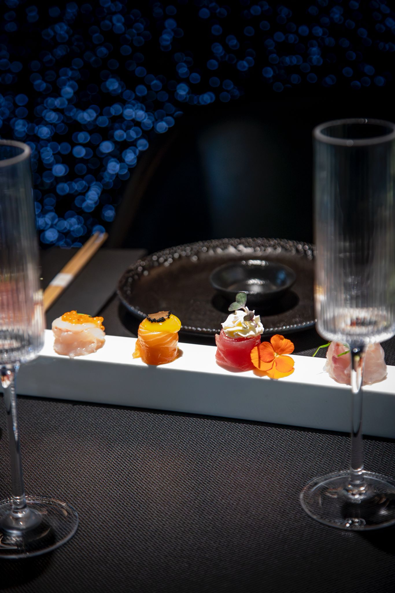 sushi on black ceramic plate