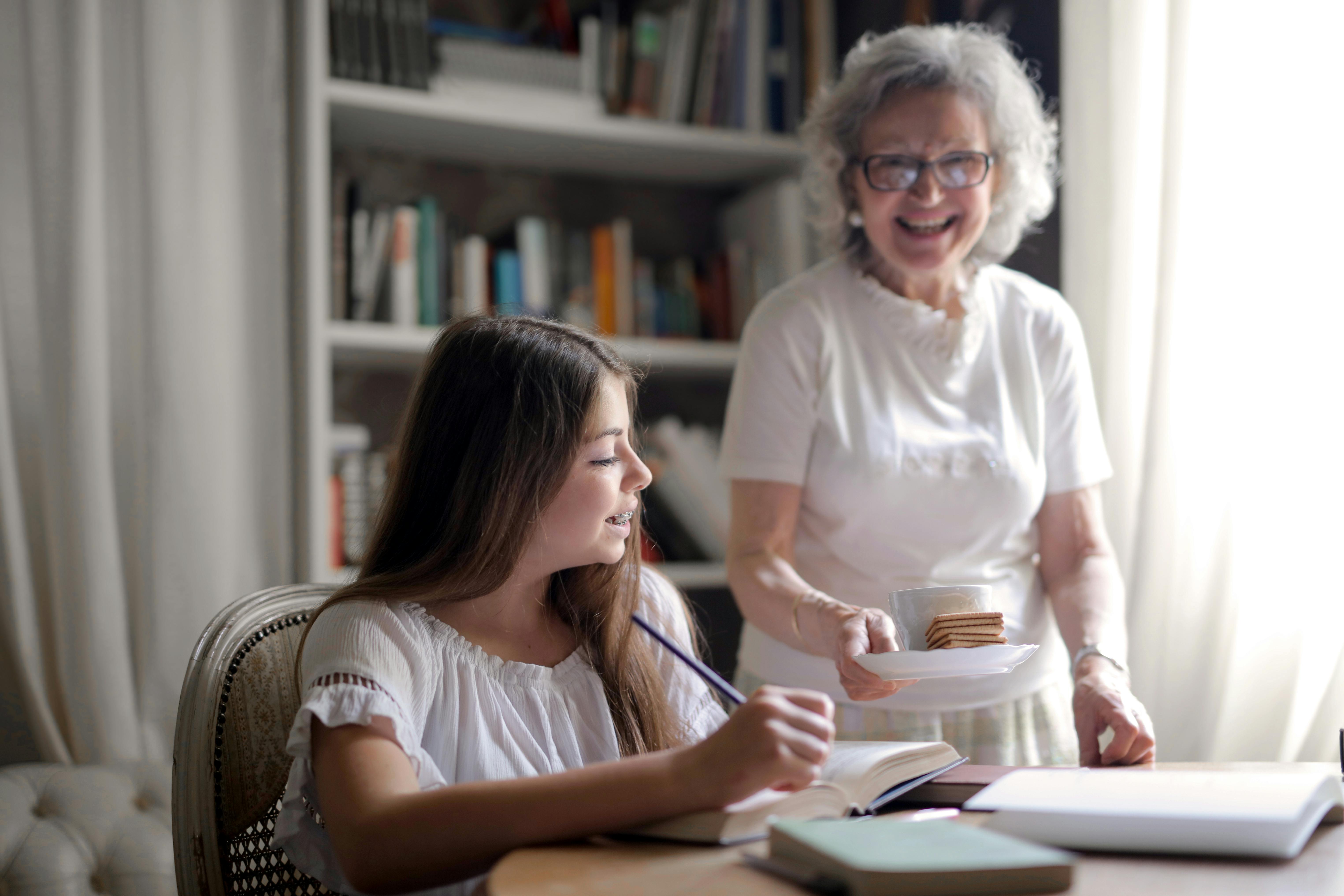 Conversion Truth for Families: Mother and young daughter sitting at a table
