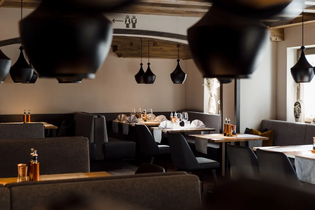 Dining room with tables and pendant lights
