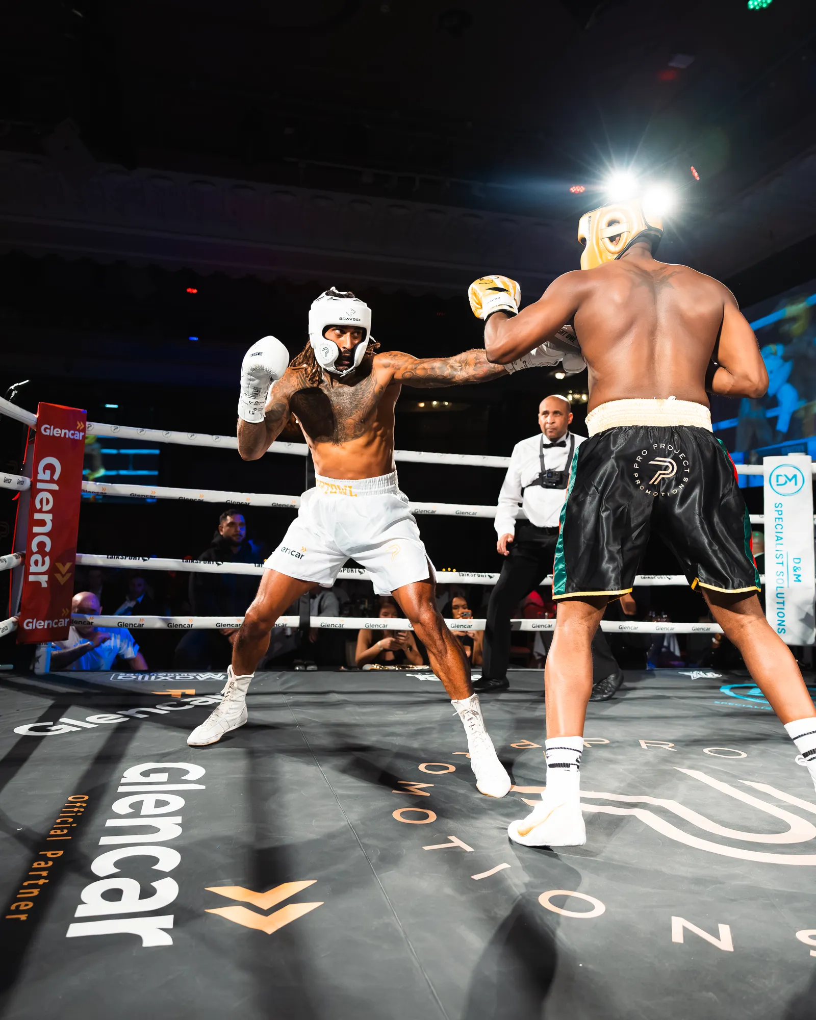 Armand Traroe vs Sebastien Bassong in a boxing match