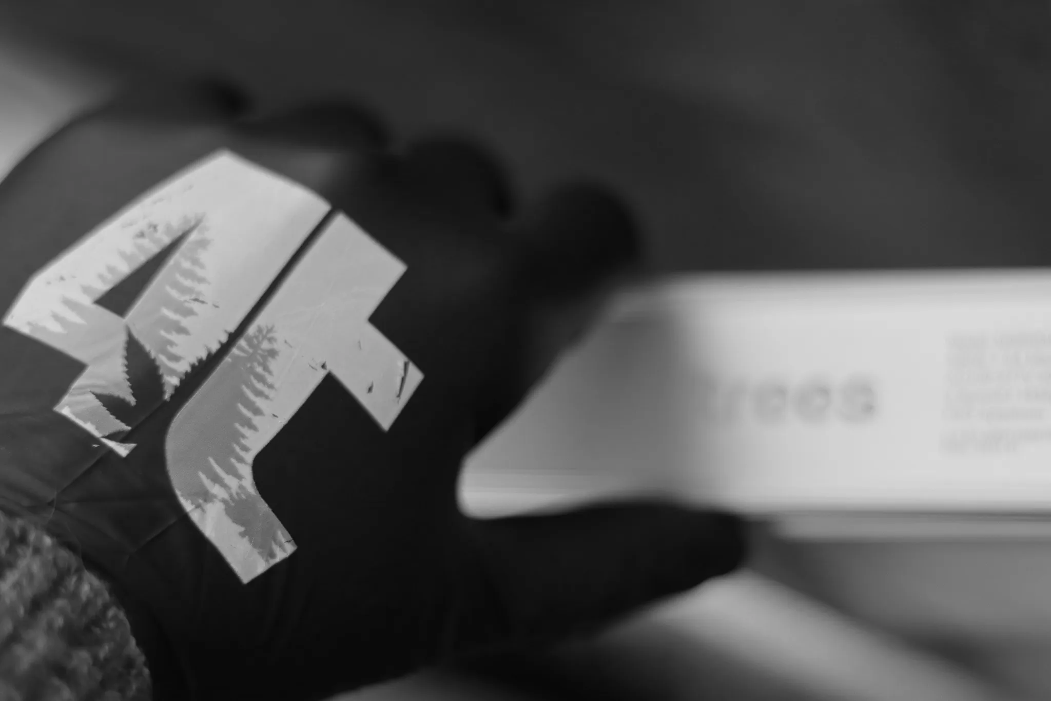 Hand in 4trees glove holding a grow light