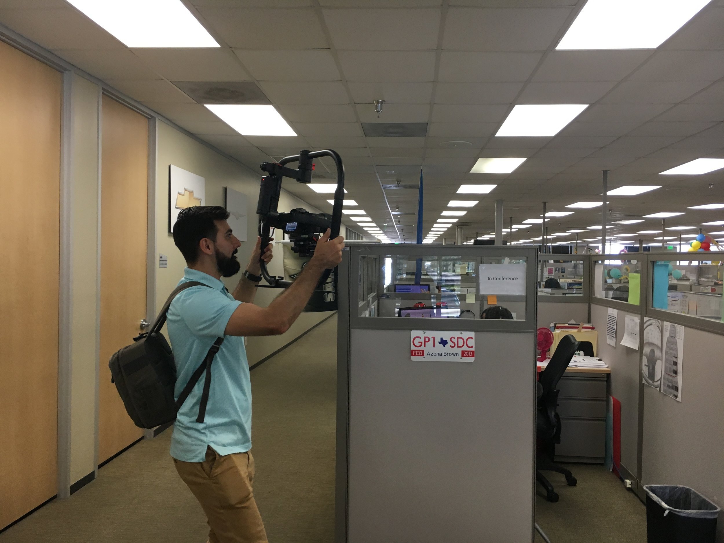  Behind the scenes! Our video ninja filming B-roll of the offices. 