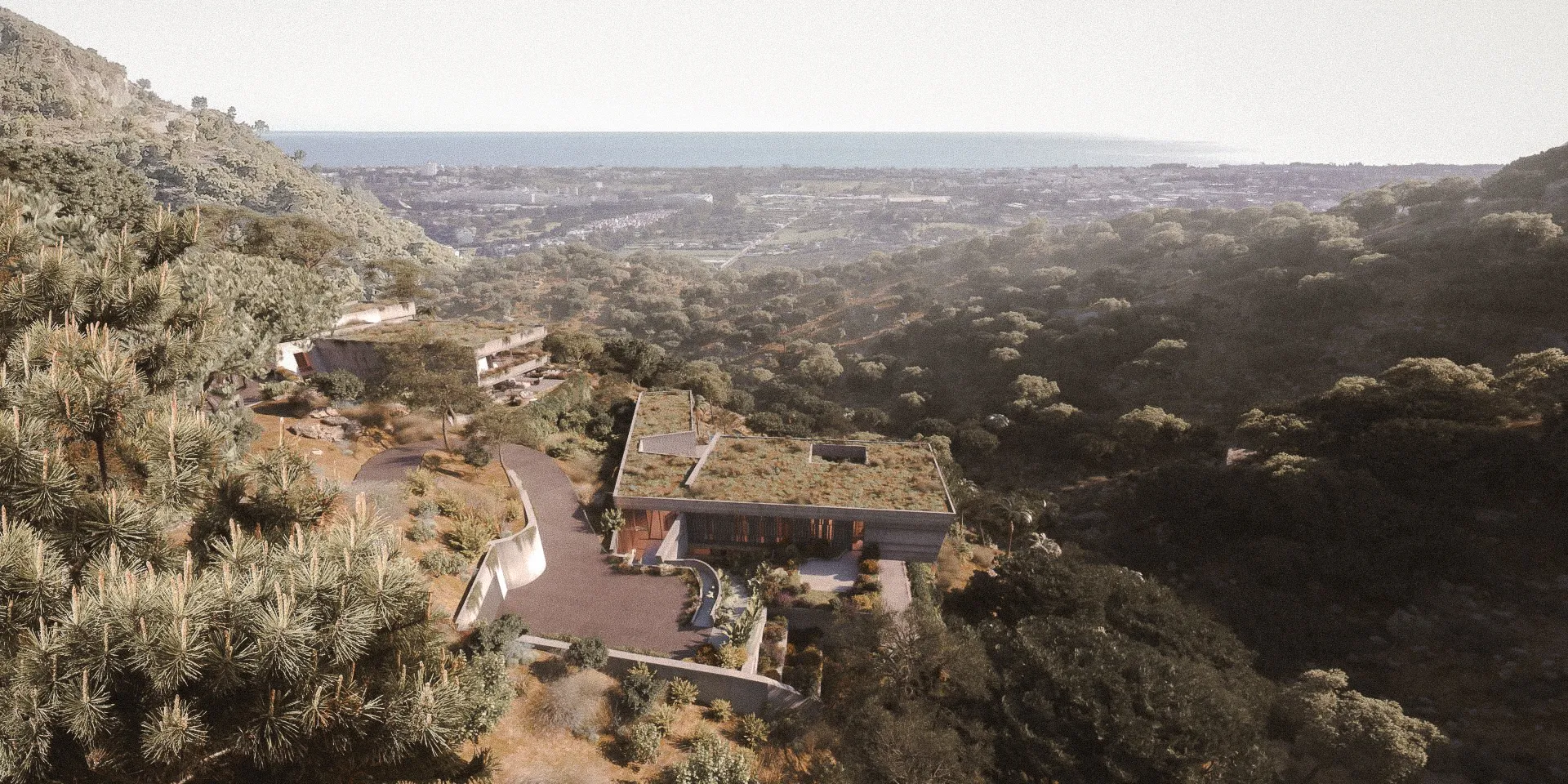 Aerial view of Villa Brisana and Villa Alvora overlooking the hills of El Madroñal.