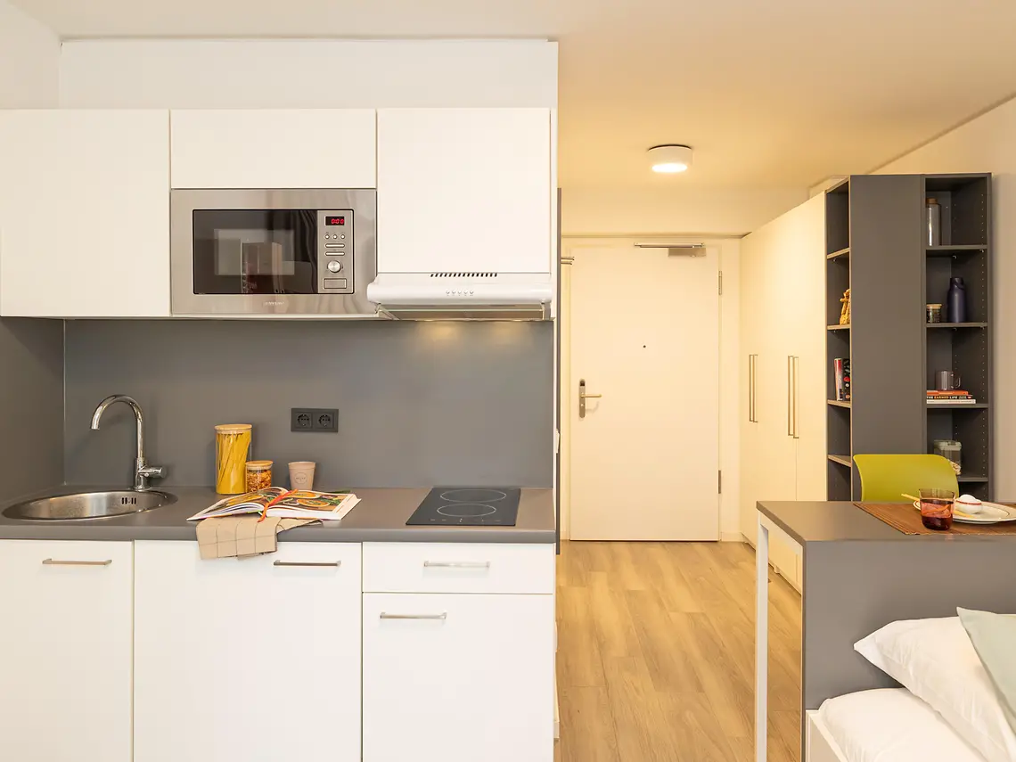Private kitchenette in student accommodation in Frankfurt with cooking and storage space