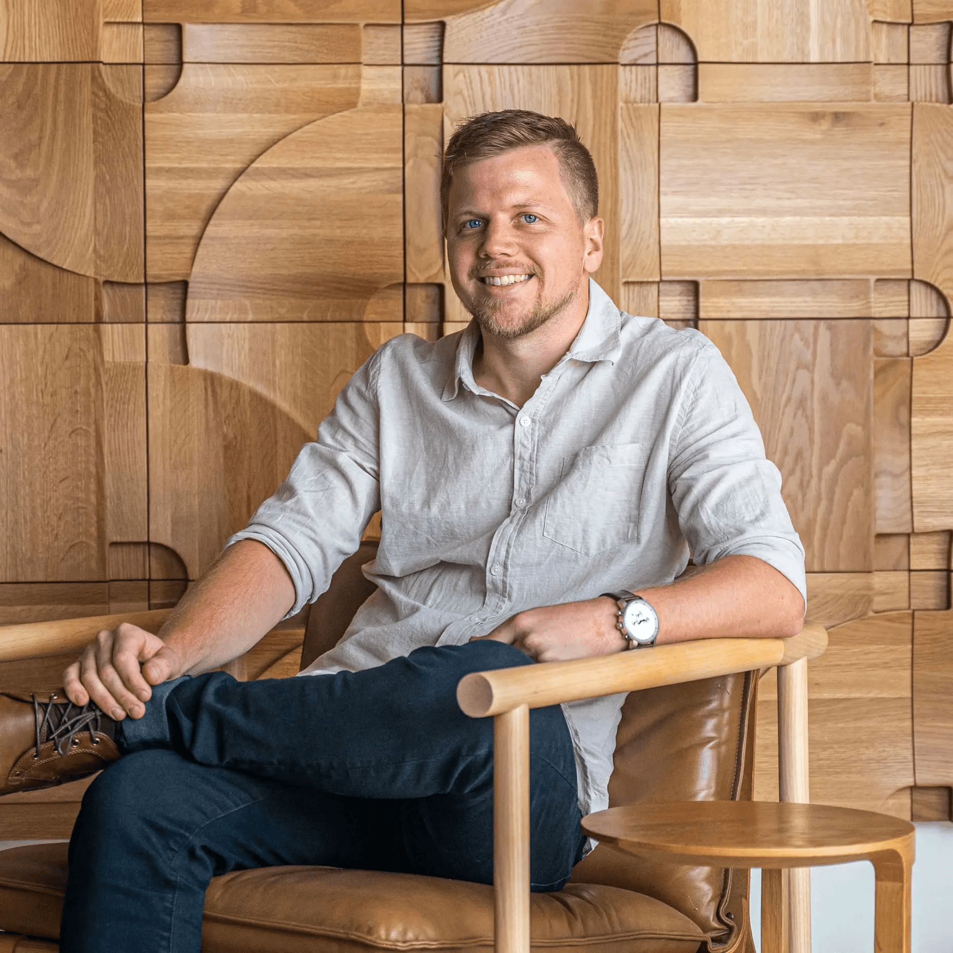 A fast black sports car races down the highway.