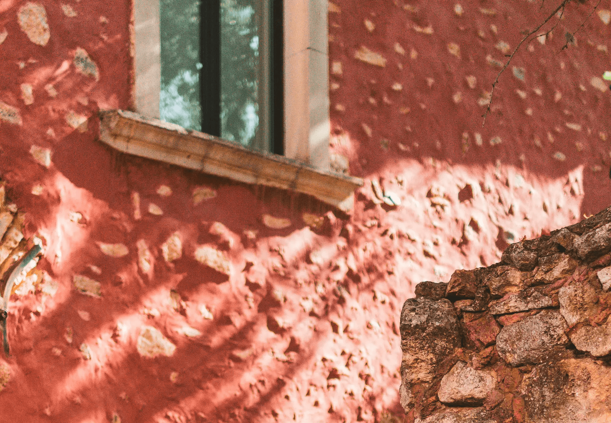 brown wooden window on brown brick wall