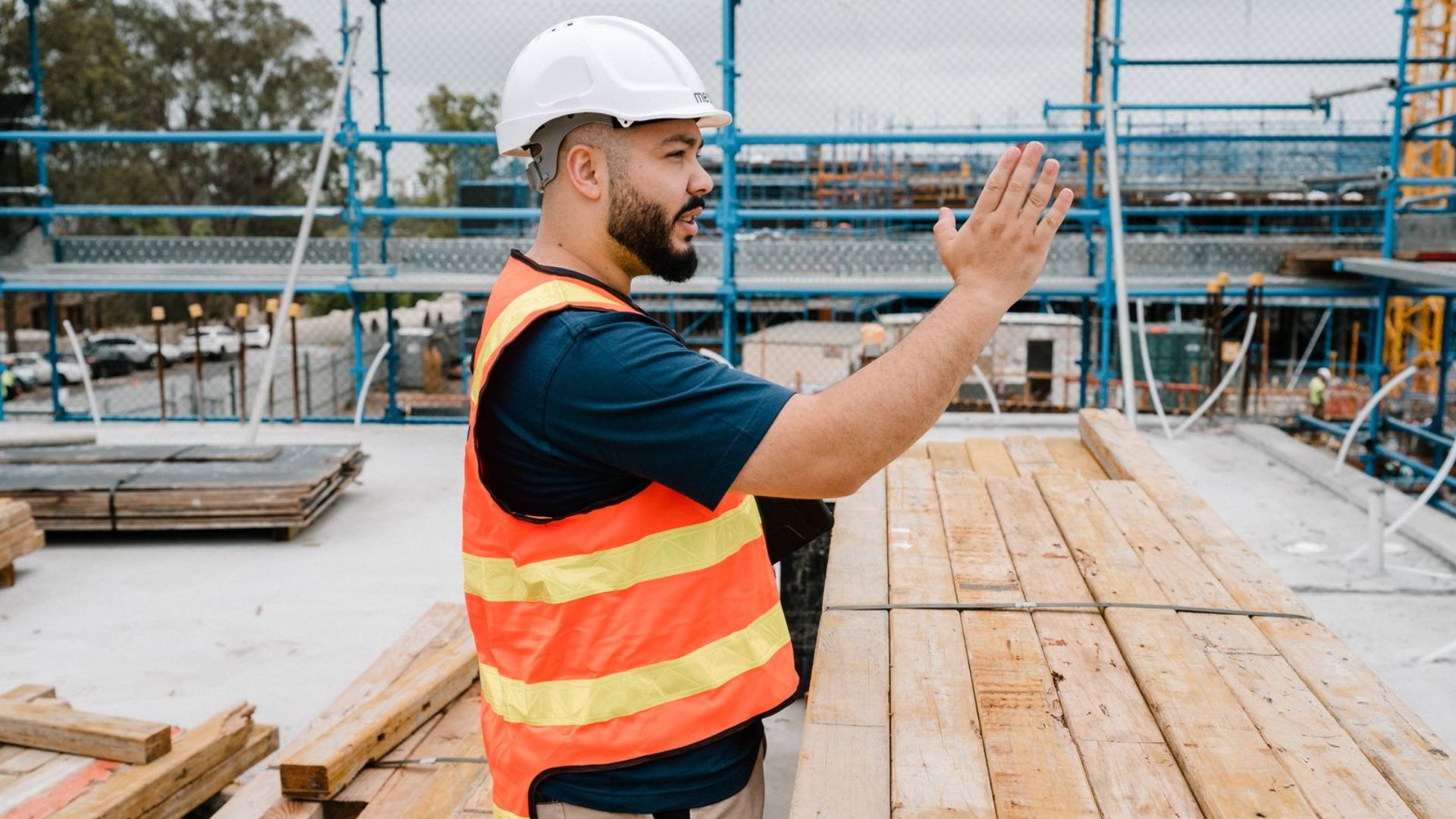 grayscale photo of people walking towards building