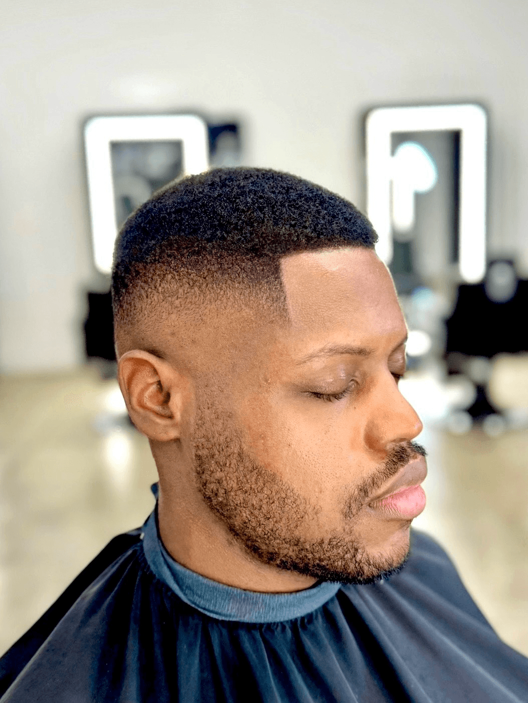 High drop fade with sharp straight razor line up. Los Angeles Barber, West Hollywood, Courtney Palmore