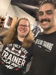 man in black hoodie standing