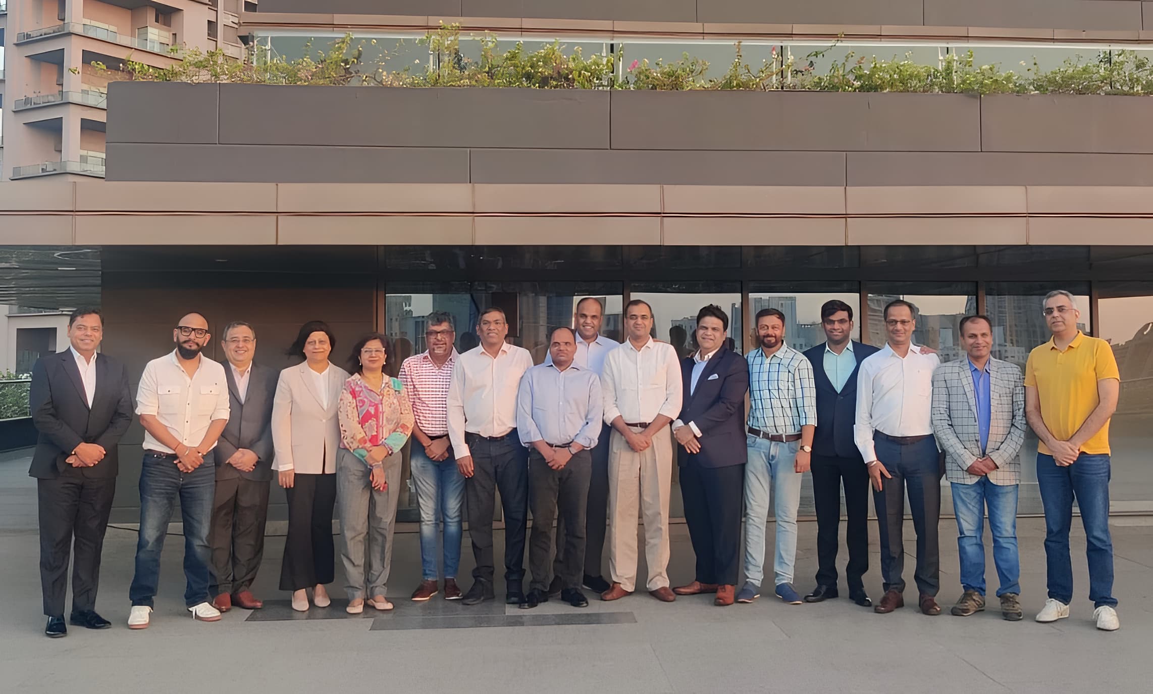 A group of men with Mridula Sankhyayan