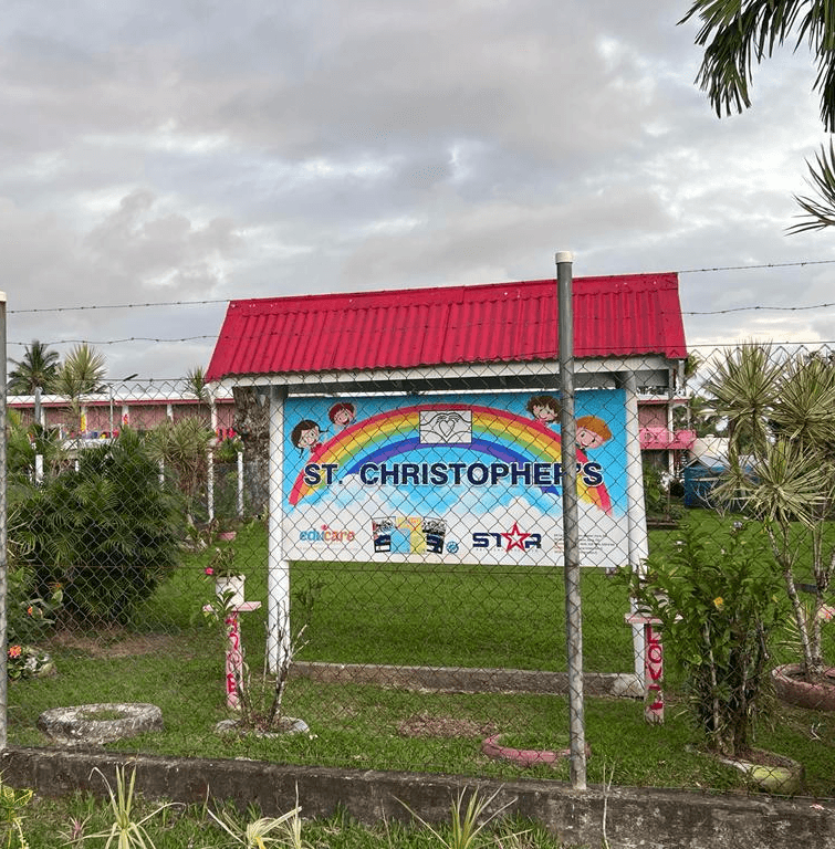 boy holding stock pot