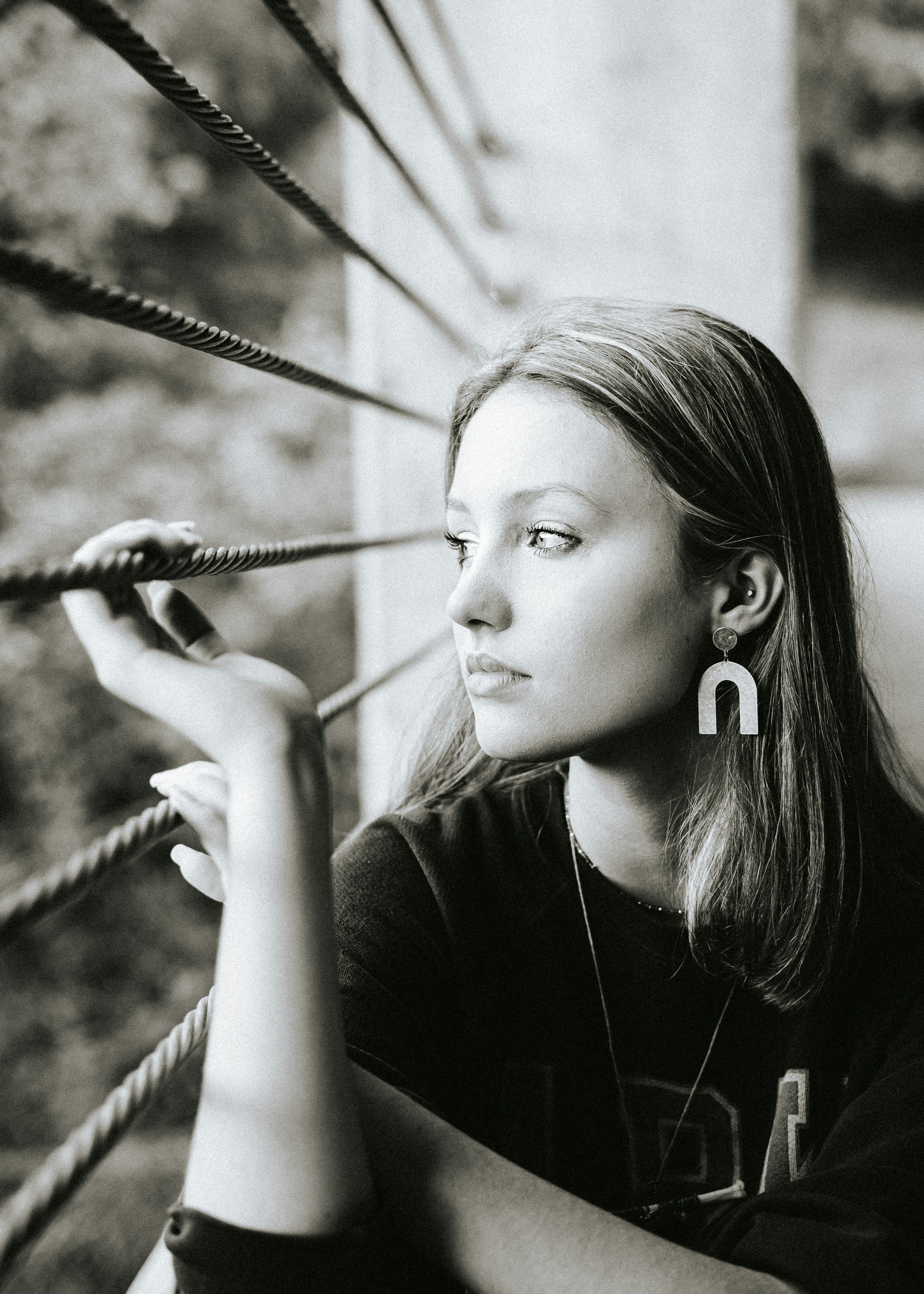 a woman holding a chain