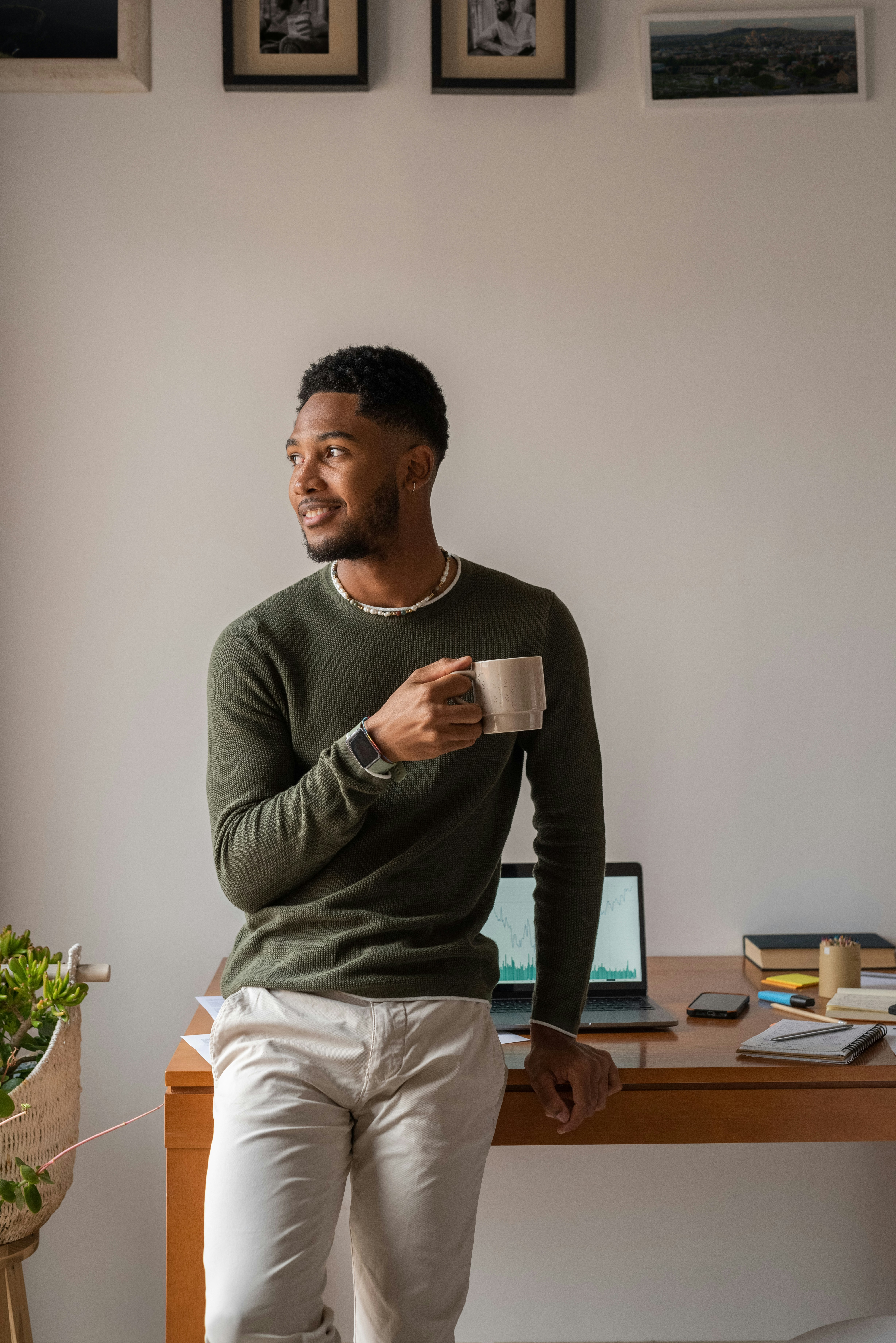 Mobile phone displaying PayEvo payment notification showing vendor payment of $1,984.00 sent via Business Payments