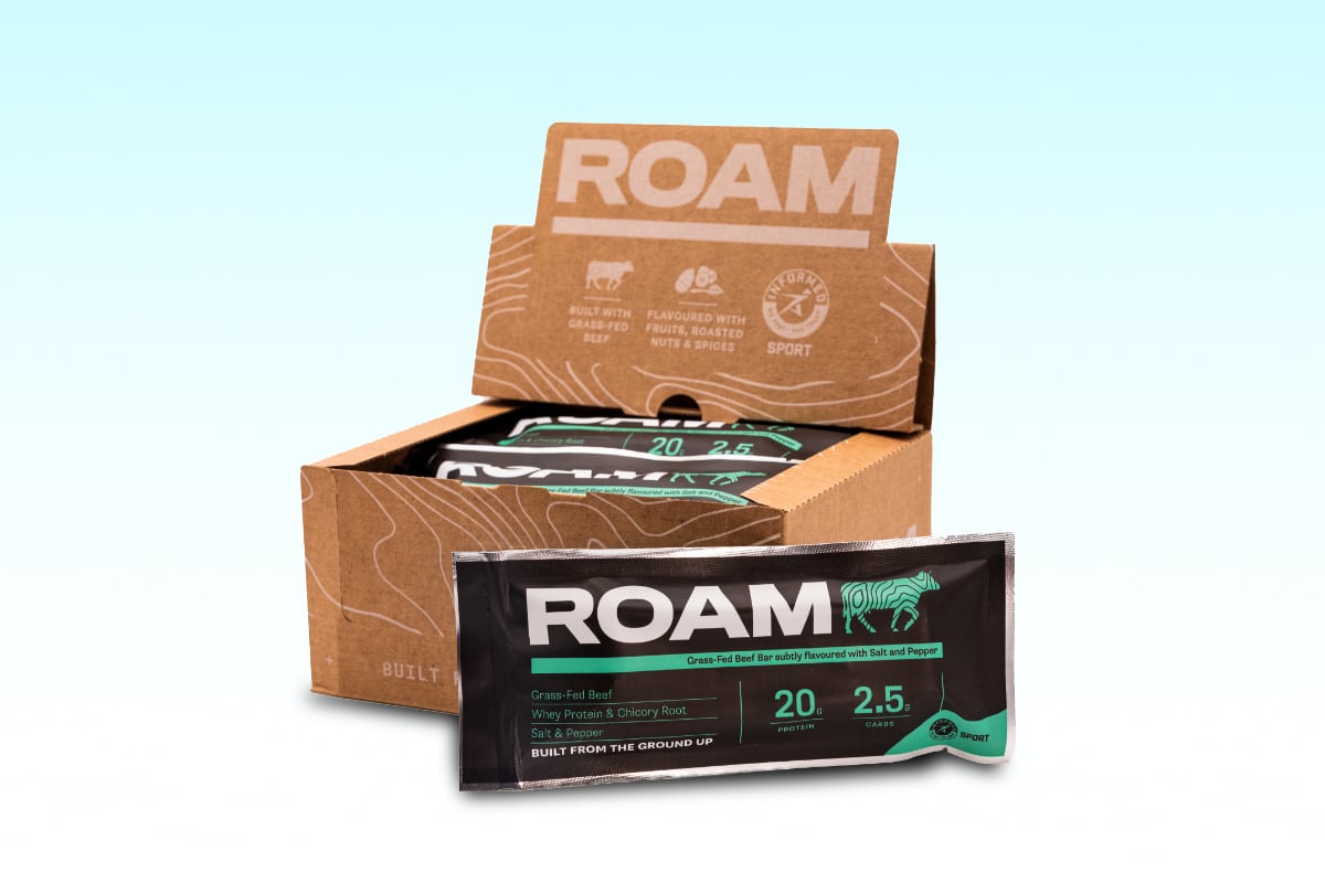 A ROAM bar in front of a box of bars