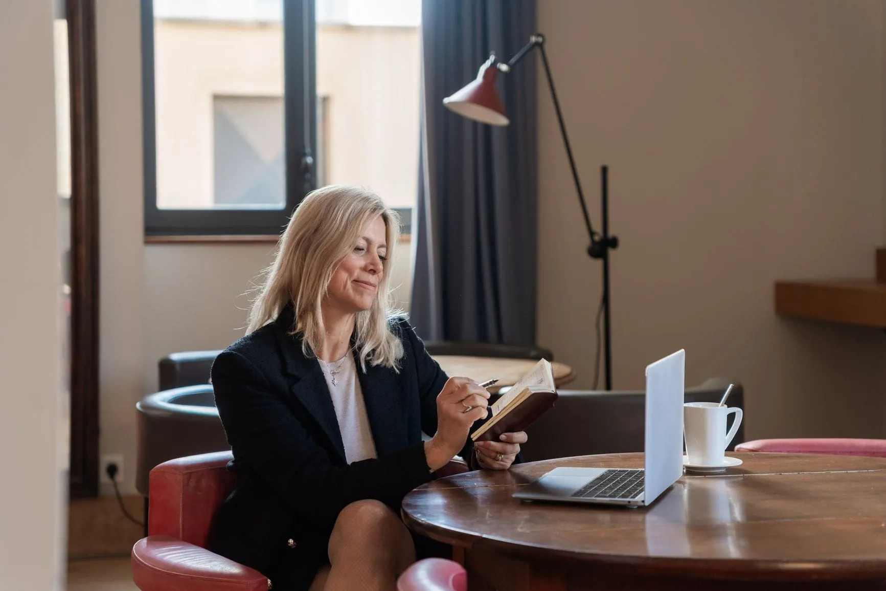 Woman reviewing her financial plan at home