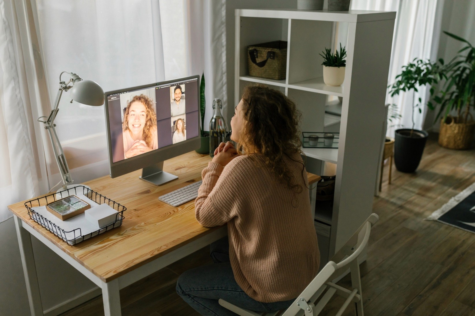 A woman participating in a video mediation session