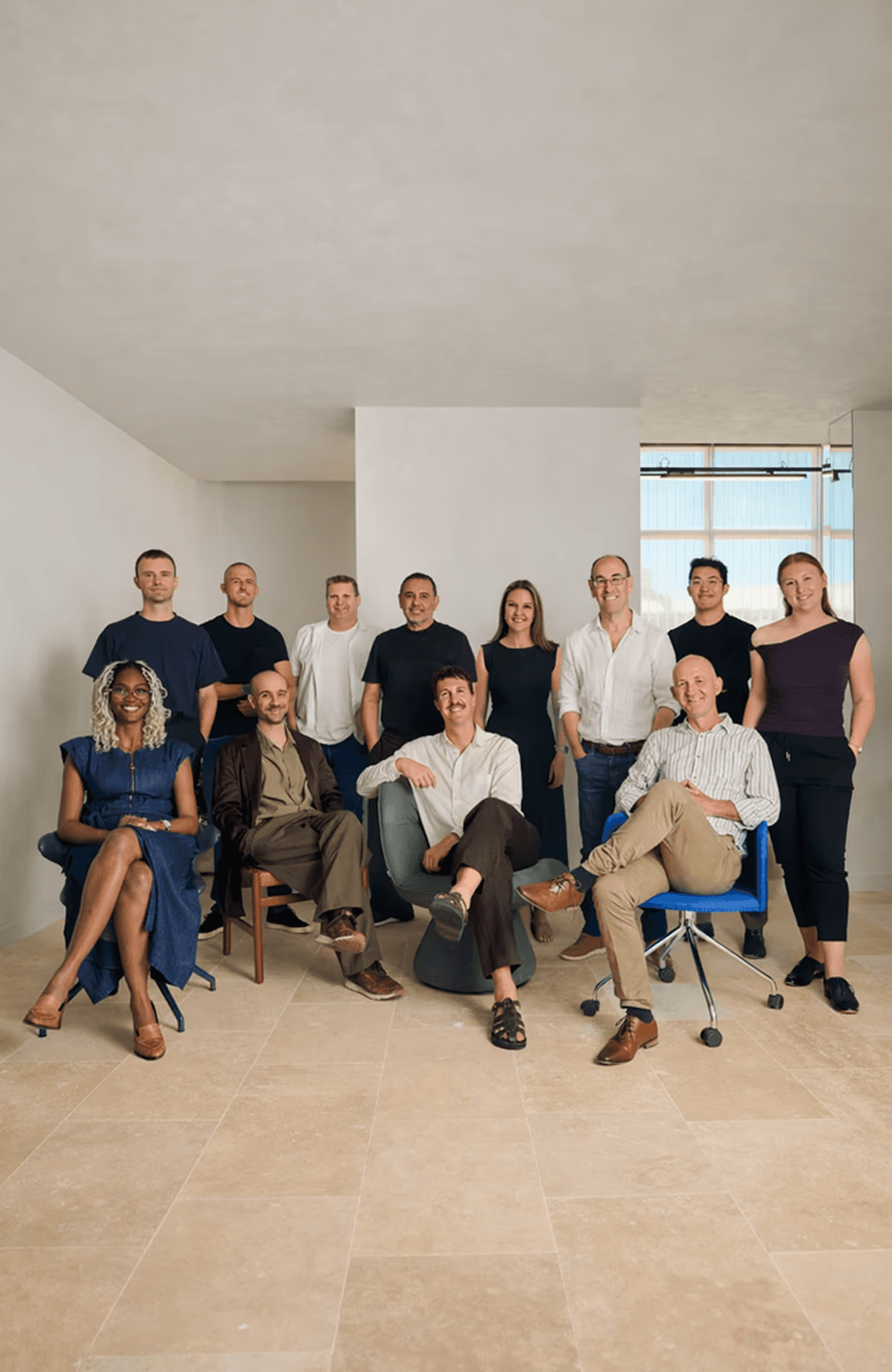 low angle photo of beige concrete building under cloudy sky
