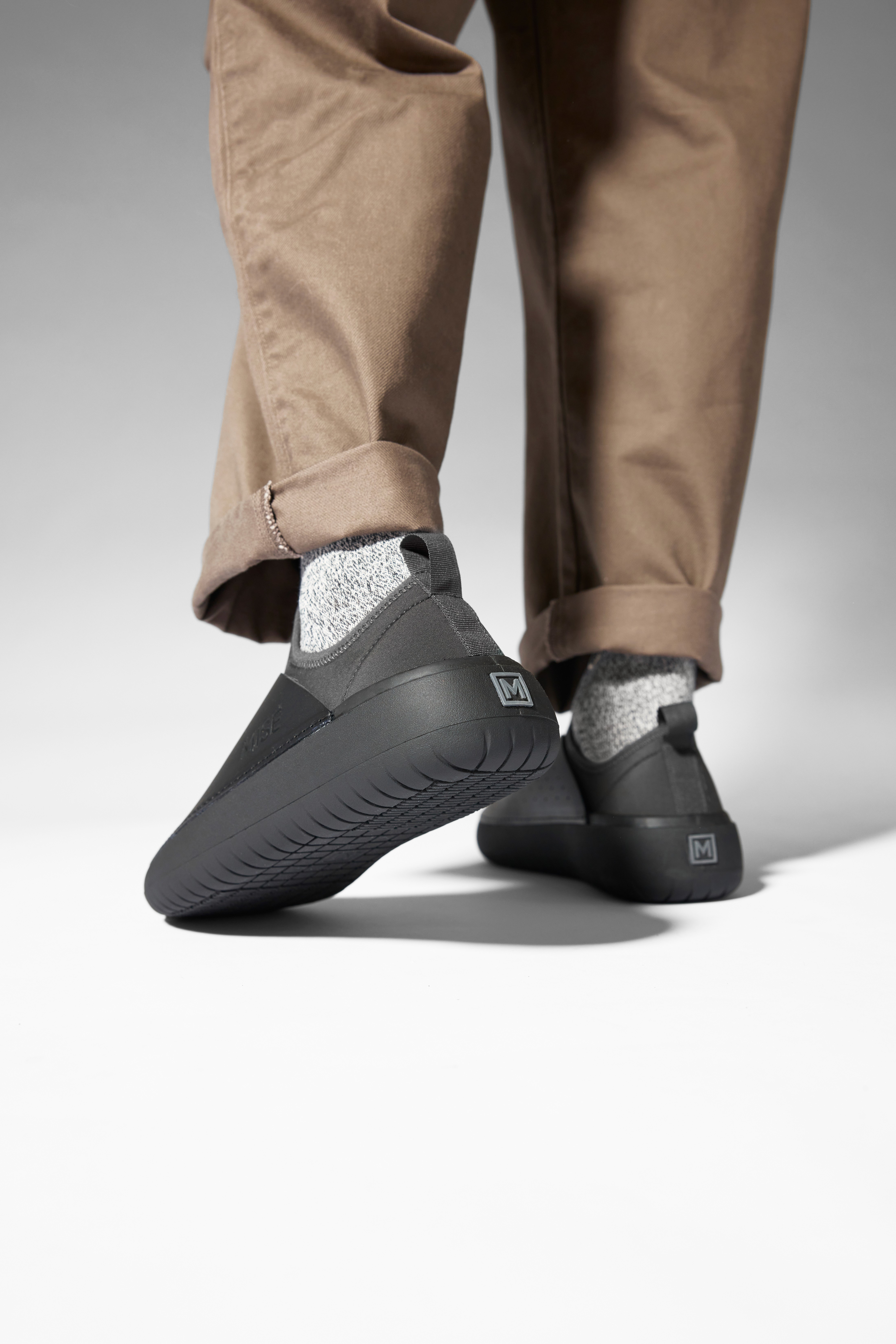 The Standard 2 MISE kitchen shoe in black on foot heel view