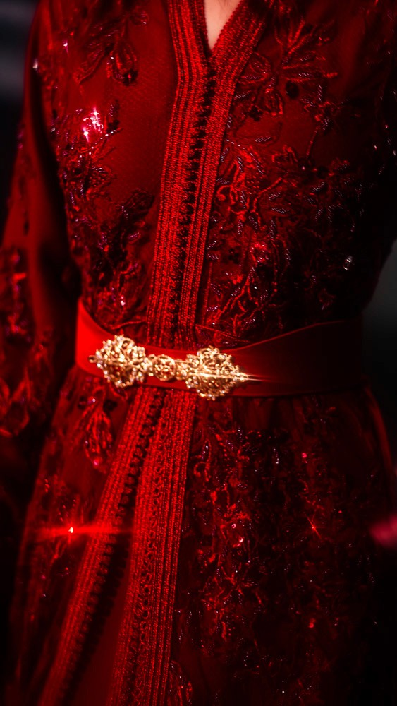 Crimson Moroccan caftan with rich handcrafted detailing, luxury evening wear designed for Bahrain and Gulf clients
