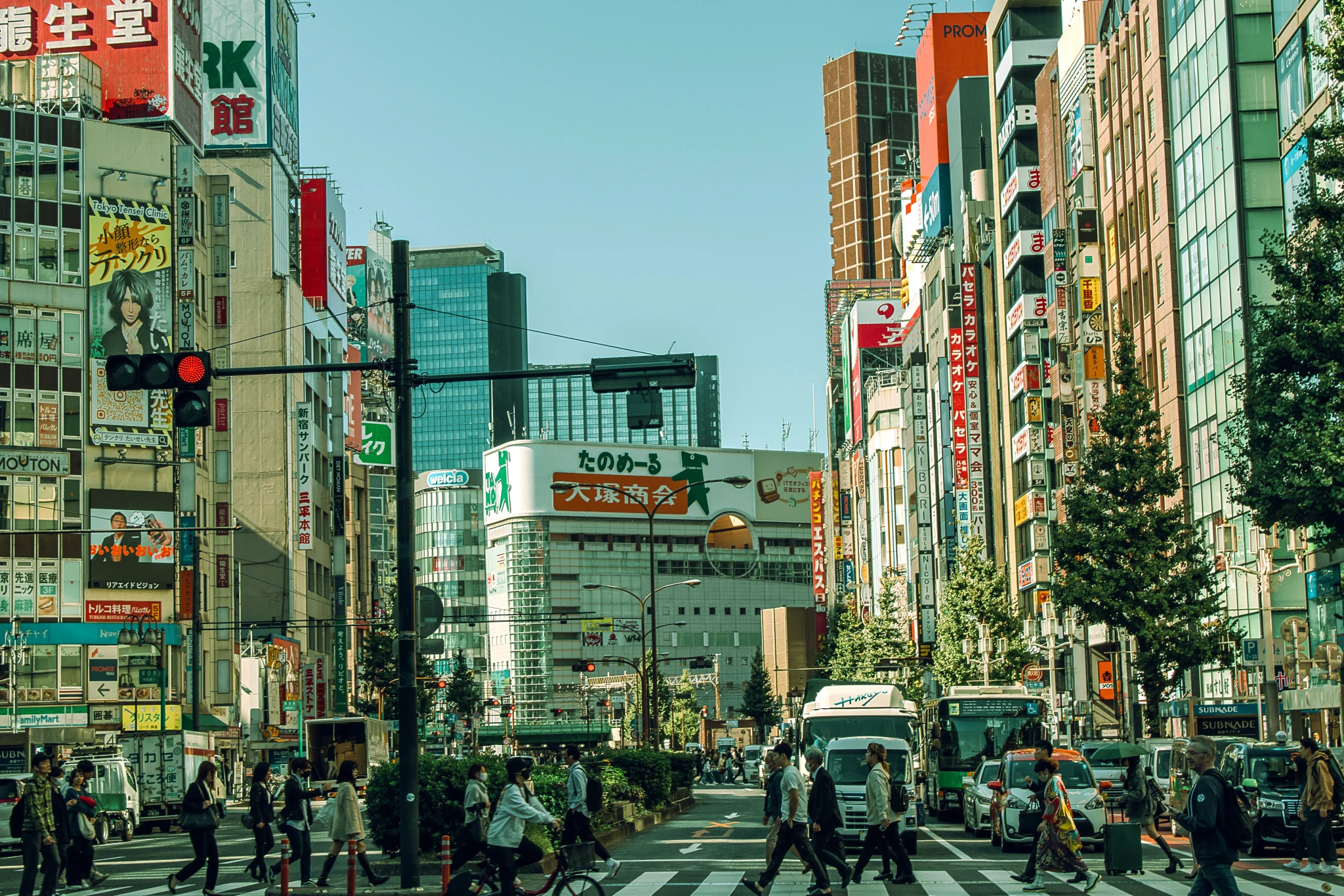 A crowded street of Shinjuku in Tokyo at day