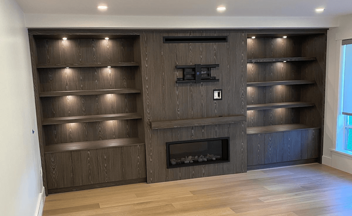 custom millwork shelving fireplace unit dark wood burton millwork