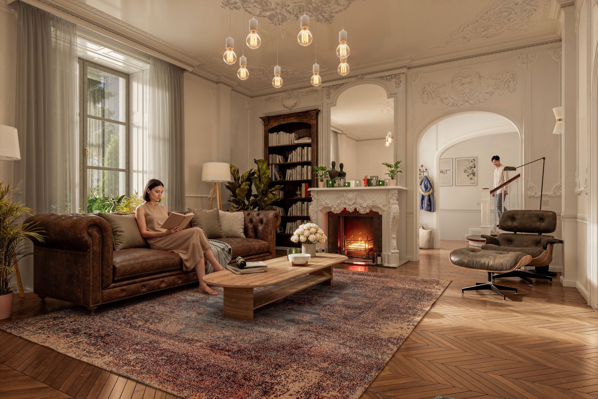 Luxury Parisian-style living room interior design featuring ornate plaster crown mouldings, tufted brown leather Chesterfield sofa, Eames lounge chair, herringbone hardwood flooring, marble fireplace surround, and Edison bulb pendant lighting