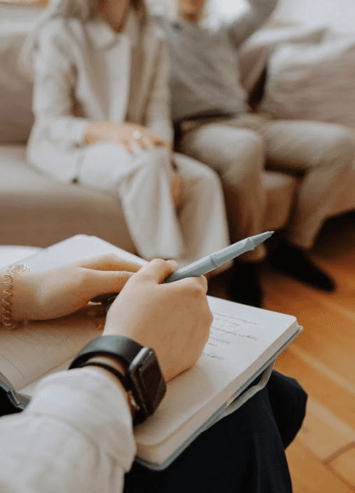 two gray sofas beside pool in room