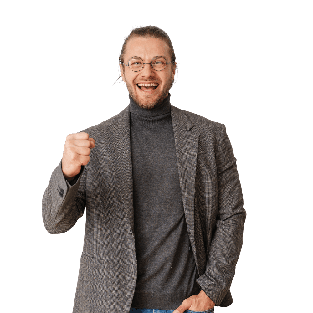 Smiling man celebrating a positive outcome, symbolising confidence and satisfaction with physiotherapy treatment.