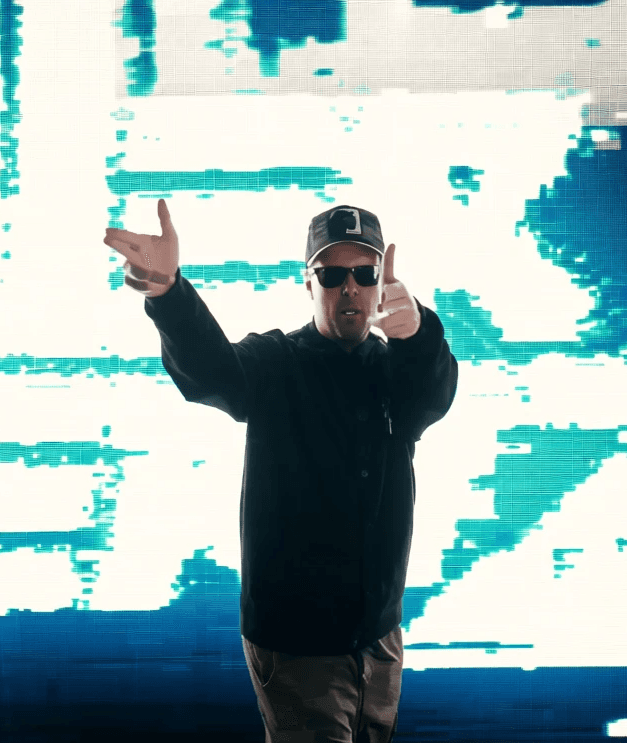a man smoking a cigarette in a black and white photo