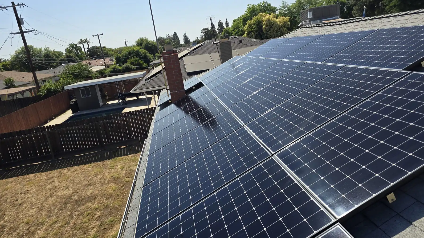 Residential rooftop solar array, wide view | Premier Solar Service, serving Fresno, CA